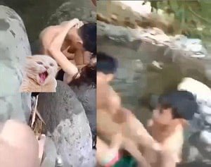 บนฝั่งของลำธารกลุ่มคนหนุ่มสาวมีเมฆมาก